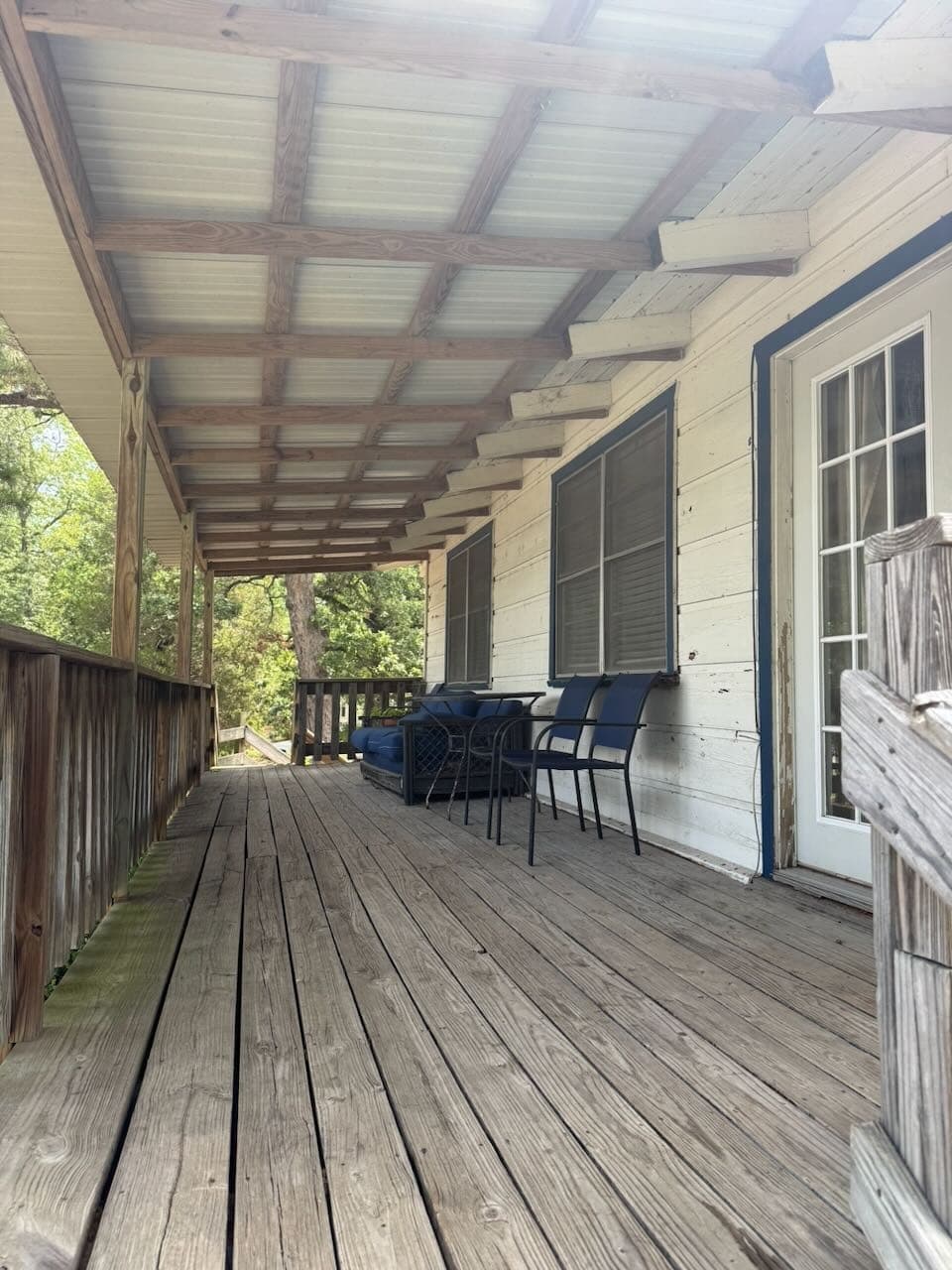 Covered porch along the cabin