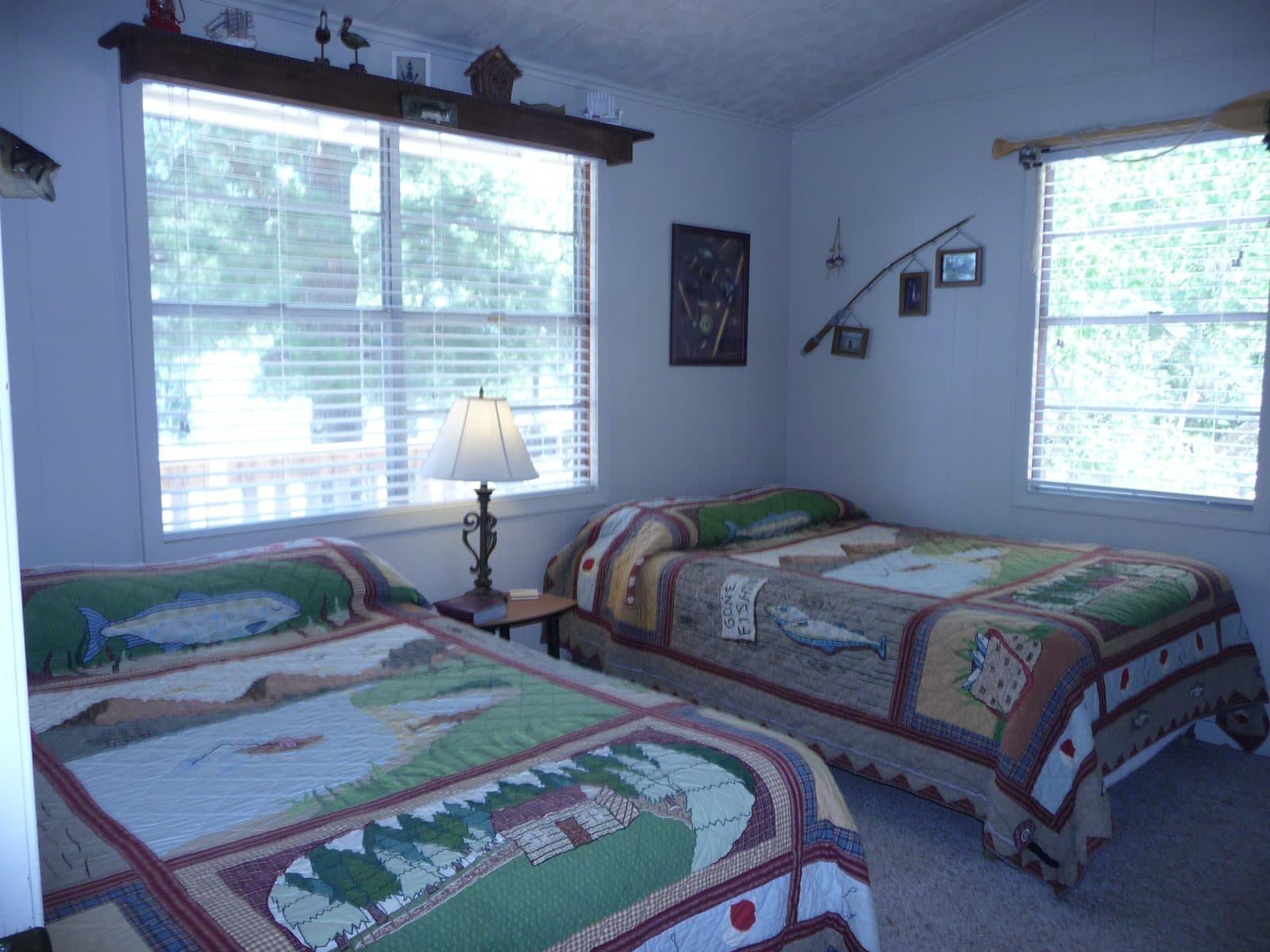Bedroom with lake-resort furnishings