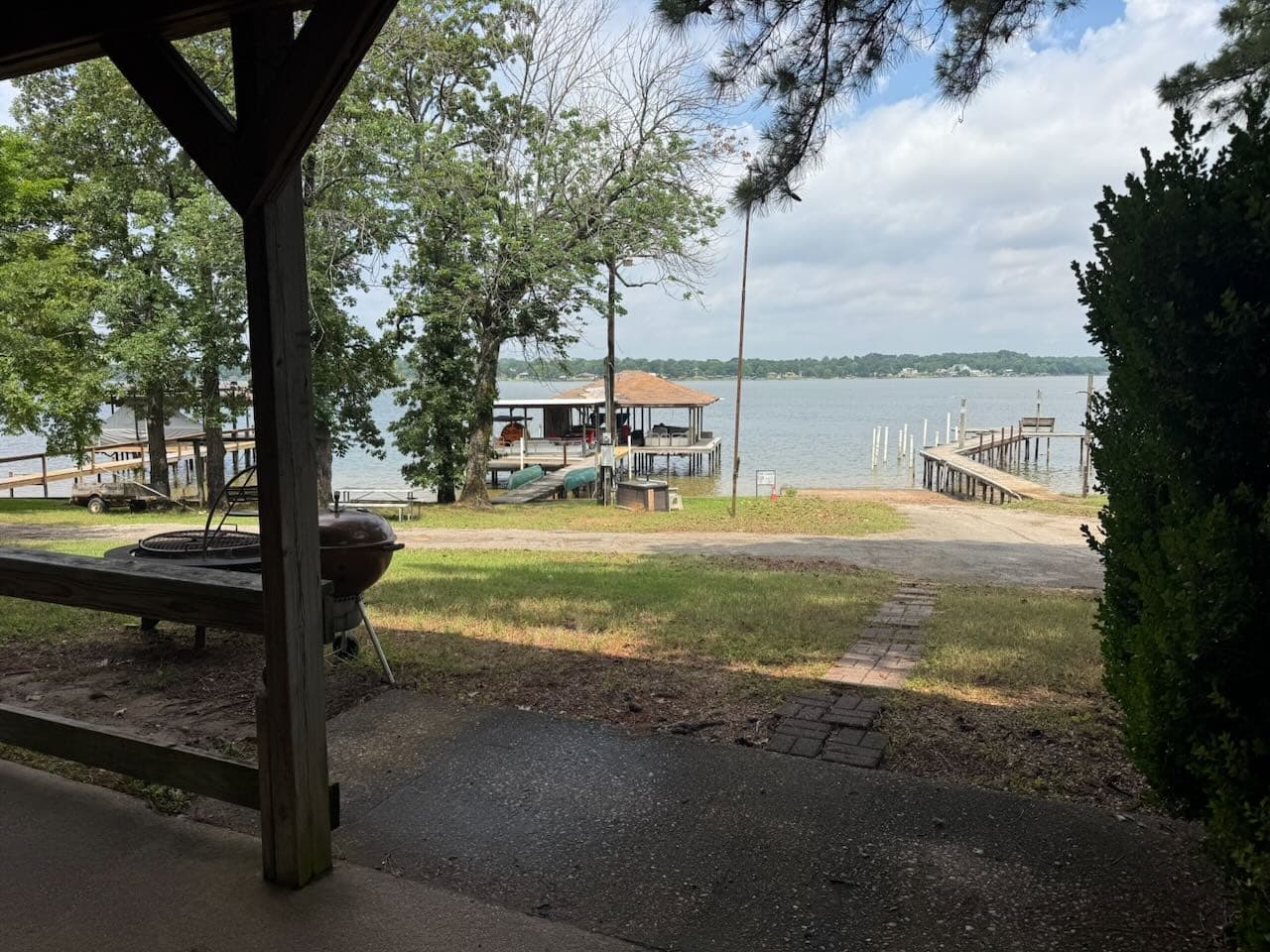 Lake, dock, and grill from the patio